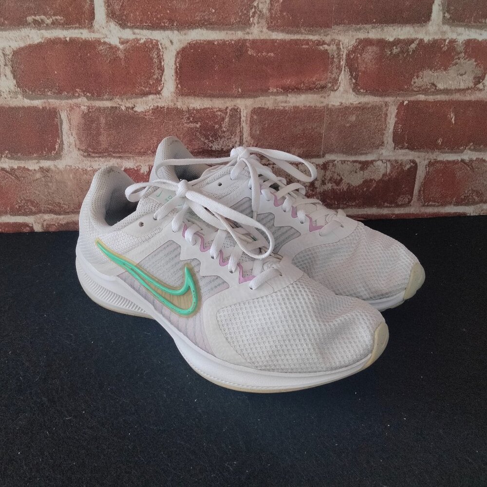 Nike White Athletic Running Shoes with Mint & Light Purple Accents
